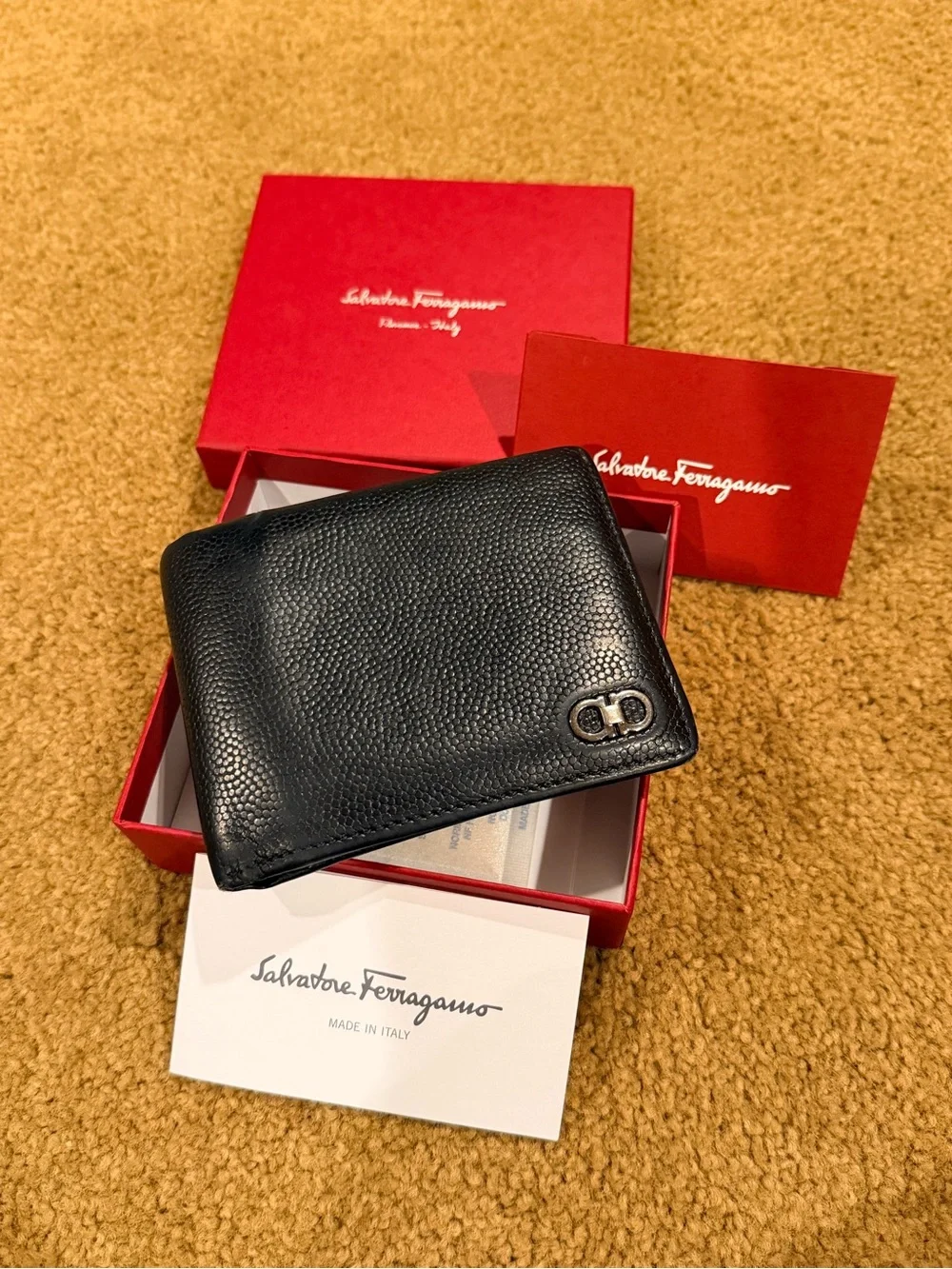 Salvatore Ferragamo Black Pebbled Leather Bi-Fold Wallet with Metal Logo